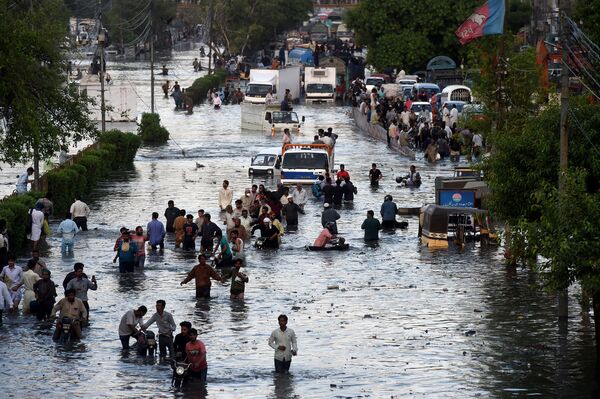 Затопленные улицы в Карачи, Пакистан  - Sputnik Южная Осетия