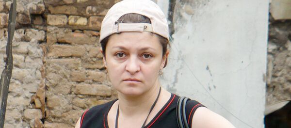 Ревмира Алборова у пепелища своего дома во время войны 08.08.08 - Sputnik Южная Осетия