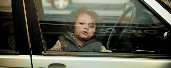 Ребенок в машине Ребенок в машине - Sputnik Южная Осетия