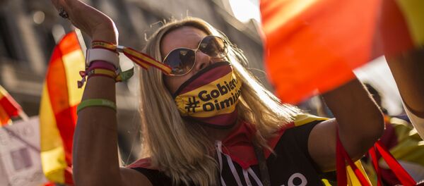 Участница антиправительственной акции в Мадриде, Испания Участница антиправительственной акции в Мадриде, Испания - Sputnik Южная Осетия