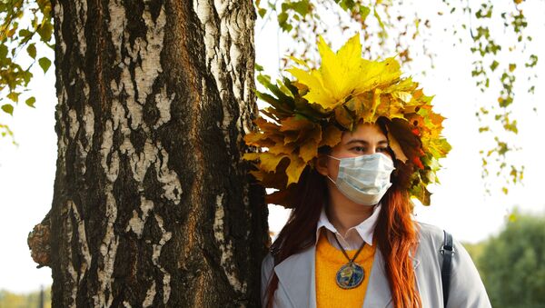  Девушка в защитной маске. - Sputnik Южная Осетия