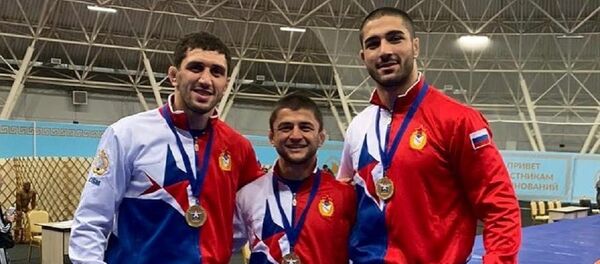 Заурбек Сидаков, Азамат Тускаев и Асланбек Сотиев Заурбек Сидаков, Азамат Тускаев и Асланбек Сотиев - Sputnik Южная Осетия