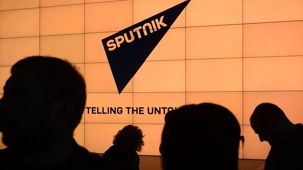Логотип международного информационного бренда Спутник - Sputnik Южная Осетия