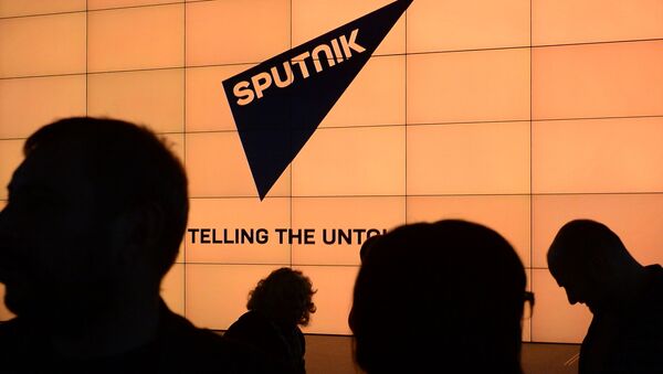 Логотип международного информационного бренда Спутник - Sputnik Южная Осетия