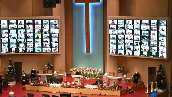 Онлайн-трансляции рождественского богослужения в церкви в Сеуле, Южная Корея  - Sputnik Южная Осетия