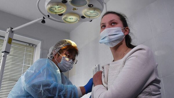 Вакцинация медиков от коронавируса. Архивное фото - Sputnik Южная Осетия