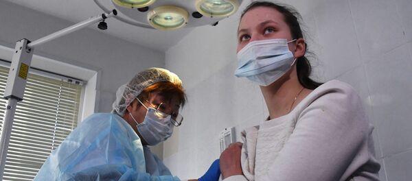 Вакцинация медиков от коронавируса. Архивное фото Вакцинация медиков от коронавируса. Архивное фото - Sputnik Южная Осетия