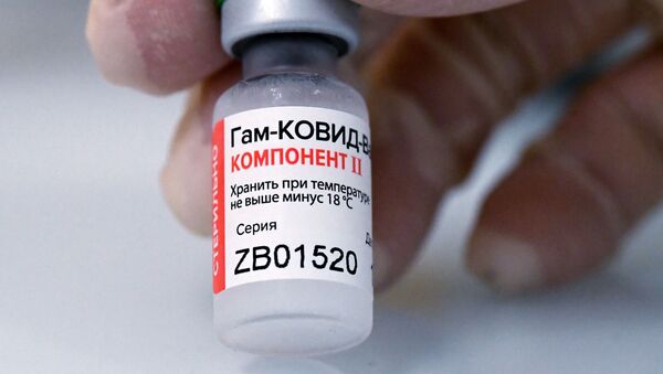 Ампула с вакциной против COVID-19 Спутник V  - Sputnik Южная Осетия