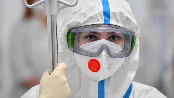 Медсестра в инфекционной клинической больнице №2 Департамента здравоохранения города Москвы - Sputnik Южная Осетия