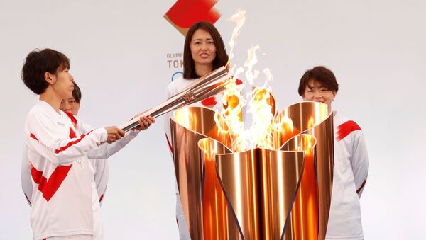 Эстафета олимпийского огня в Токио-2020 - Sputnik Южная Осетия
