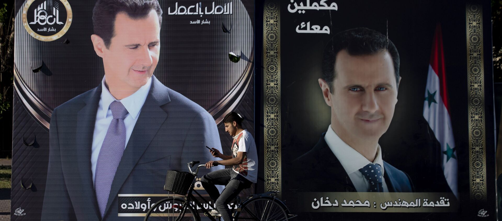 Рекламные плакаты президента Башара Асада на улице в Дамаске - Sputnik Южная Осетия, 1920, 25.05.2021