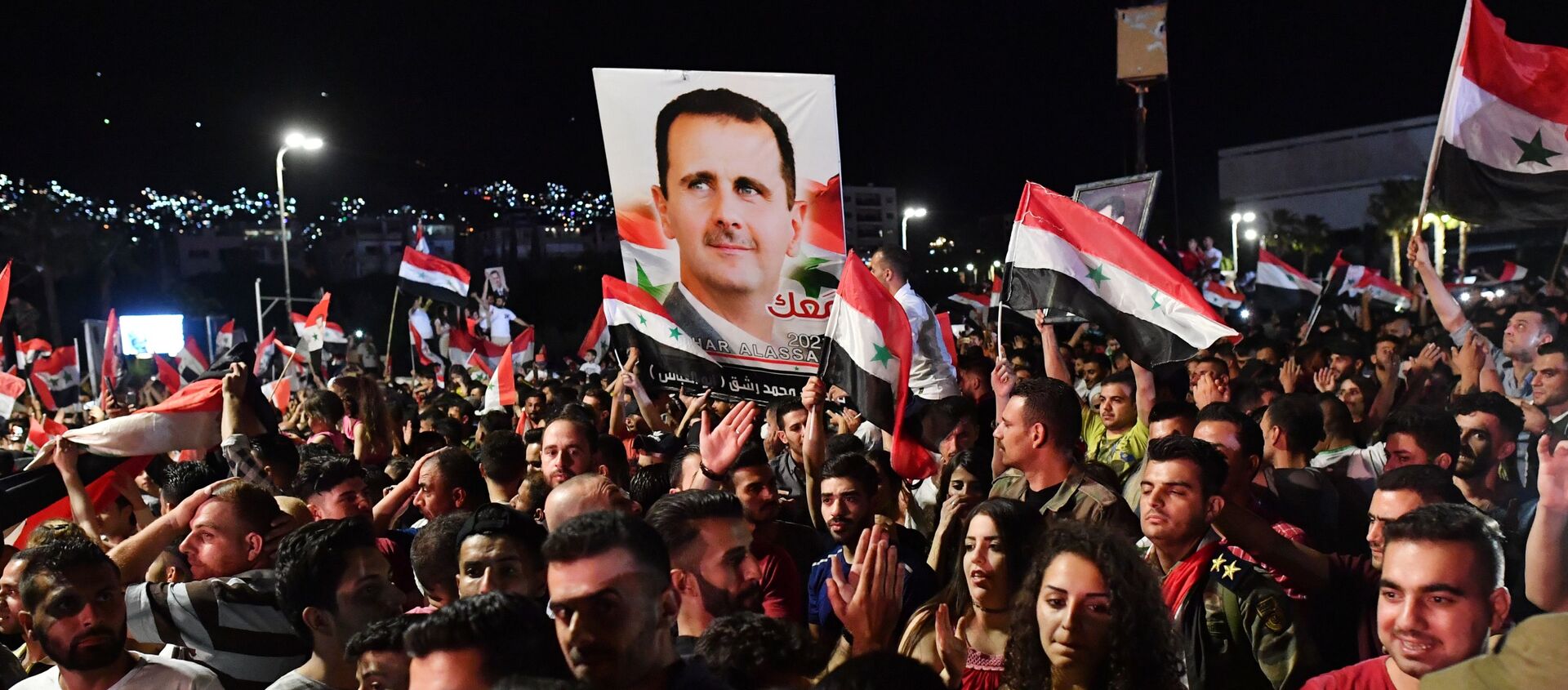 Празднование победы Б. Асада на президентских выборах в Сирии - Sputnik Южная Осетия, 1920, 28.05.2021
