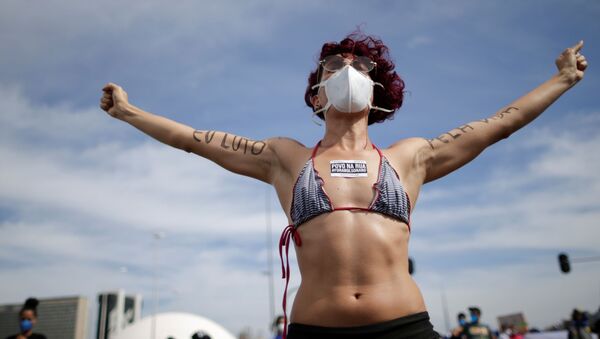 Участница антиправительственного протеста в Бразилиа, Бразилия - Sputnik Южная Осетия