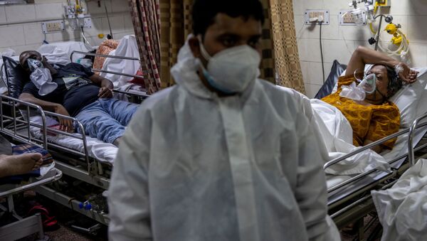 Пациенты с коронавирусом в больнице Нью-Дели, Индия - Sputnik Южная Осетия