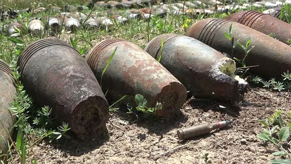 Уничтожение неразорвавшихся боеприпасов в ходе гуманитарного разминирования в Нагорном Карабахе - Sputnik Южная Осетия