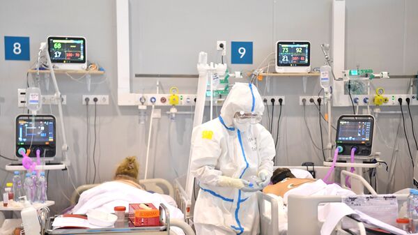 Лечение больных с COVID-19 в резервном госпитале на ВДНХ - Sputnik Южная Осетия