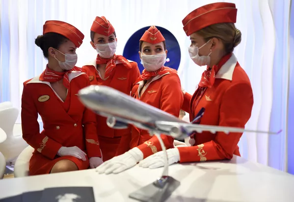 Стюардессы на стенде авиакомпании Аэрофлот ПМЭФ-2021 Стюардессы на стенде авиакомпании Аэрофлот ПМЭФ-2021 - Sputnik Южная Осетия