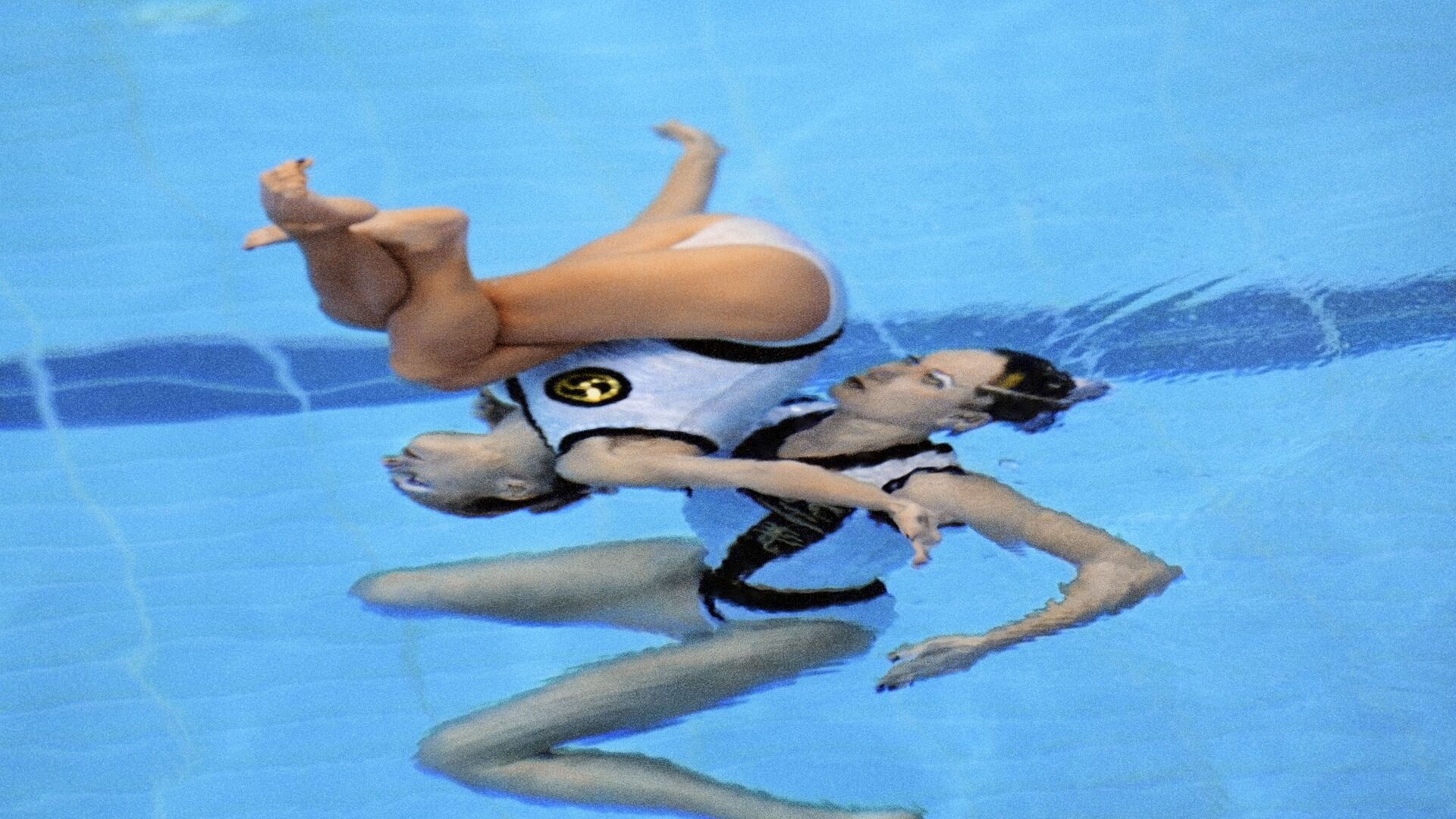 Чемпионки Олимпийских игр 2000 года по синхронному плаванию Ольга Брусникина и Мария Киселева во время выступления в Сиднее  - Sputnik Южная Осетия, 1920, 12.03.2023