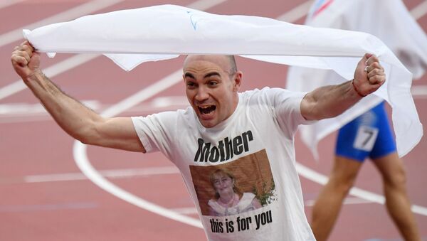 Чермен Кобесов после финиша финального забега на 400 метров  - Sputnik Южная Осетия