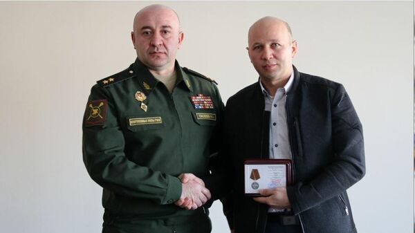 Ветераны боевых действий и военной службы награждены ведомственными знаками отличия - Sputnik Южная Осетия
