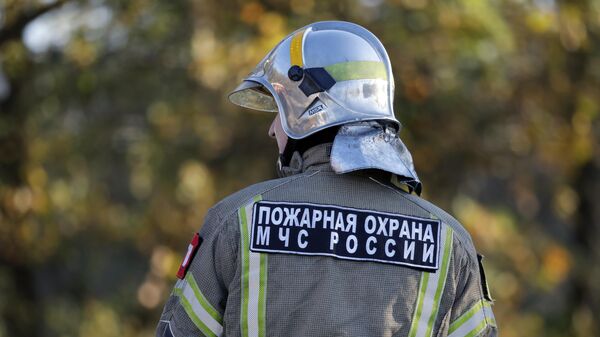 Сотрудник пожарной охраны МЧС РФ в Белгородской области. Архивное фото  - Sputnik Южная Осетия
