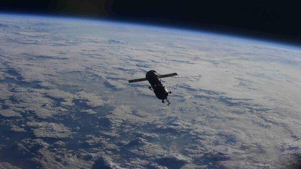 Стыковочный модуль МКС в открытом космосе. Архивное фото - Sputnik Южная Осетия