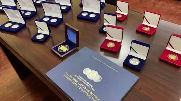 Презентация памятной монеты к 15-летию признания в Нацбанке Южной Осетии - Sputnik Южная Осетия