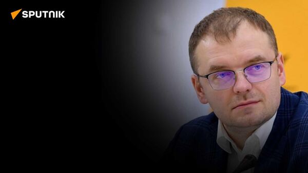 Экономист Козлов о наднациональной криптовалюте ЕАЭС, новых имиджевых проектах и дедолларизации - Sputnik Южная Осетия