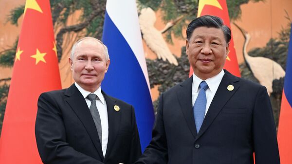 Президент РФ Владимир Путин и председатель КНР Си Цзиньпин во время встречи в Пекине - Sputnik Южная Осетия