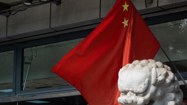 Китайский флаг на одной из улиц Пекина. Архивное фото  - Sputnik Южная Осетия