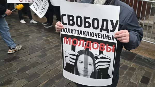 Акция протеста в связи с задержанием главы Гагаузии Е. Гуцул - Sputnik Южная Осетия