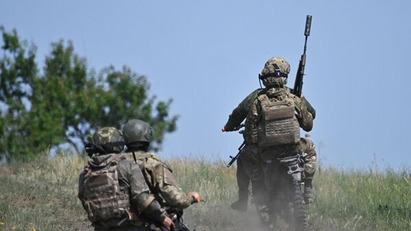 Бойцы российских штурмовых подразделений в зоне СВО. Архивное фото  - Sputnik Южная Осетия