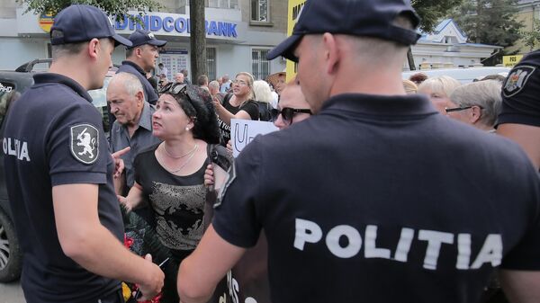 Сотрудники молдавской полиции. Архивное фото - Sputnik Южная Осетия