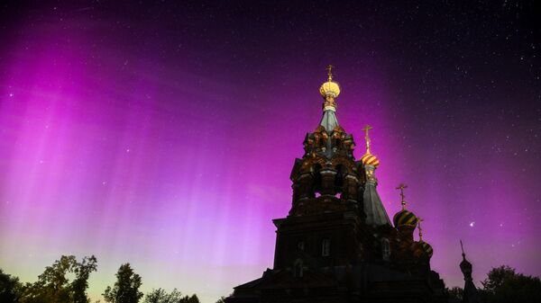 Северное сияние в Московской области из-за сильной магнитной бури. Архивное фото  - Sputnik Южная Осетия