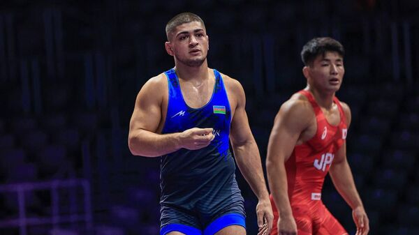 Арсений Джиоев (на переднем плане) на чемпионате мира по борьбе в Загребе  - Sputnik Южная Осетия