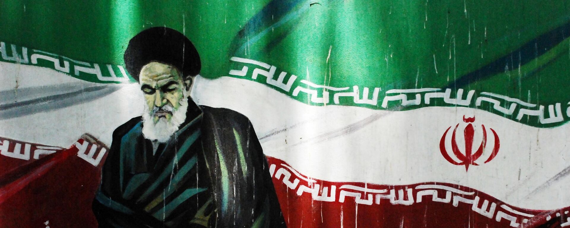 Граффити с изображением аятоллы Рухоллы Хомейни на одной из улиц в Тегеране. Архивное фото  - Sputnik Южная Осетия, 1920, 14.01.2026