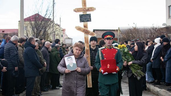 Похороны участника СВО Александра Бестаева - Sputnik Южная Осетия