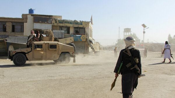 Представители афганского движения Талибан патрулируют территорию вблизи афгано-пакистанской границы. Архивное фото   - Sputnik Южная Осетия