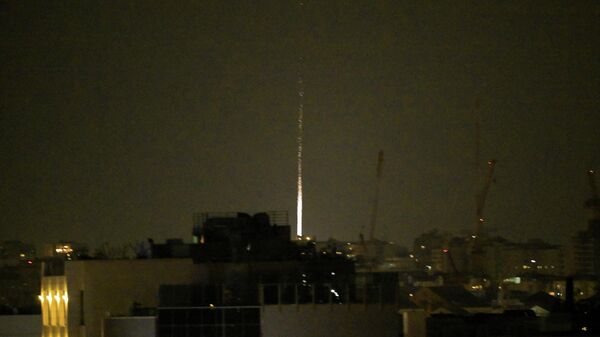 Иранская ракета упала на территорию Израиля на фоне американо-израильского конфликта с Ираном. Вид из Тель-Авива, Израиль - Sputnik Южная Осетия