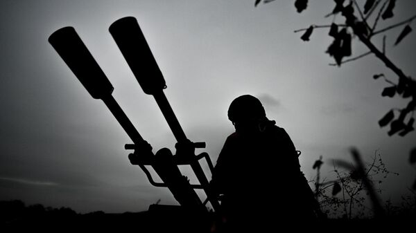 Боевая работа расчета зенитной установки ЗУ-23. Архивное фото  - Sputnik Южная Осетия