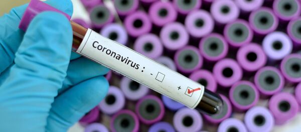 Пробирка с зараженной коронавирусом кровью  Пробирка с зараженной коронавирусом кровью  - Sputnik Южная Осетия