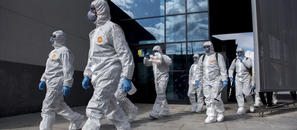 Солдаты испанской армии в защитных костюмах Солдаты испанской армии в защитных костюмах - Sputnik Южная Осетия