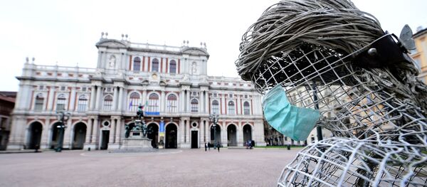 Скульптура в маске в итальянском Турине Скульптура в маске в итальянском Турине - Sputnik Южная Осетия