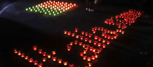 Акция в Беслане в знак поддержки и солидарности с жителями Италии, ведущими борьбу с коронавирусной инфекцией Акция в Беслане в знак поддержки и солидарности с жителями Италии, ведущими борьбу с коронавирусной инфекцией - Sputnik Южная Осетия