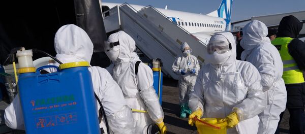 Учения спецслужб аэропорта по подготовке возможному прибытию инфицированных коронавирусом, в аэропорту Алматы. Учения спецслужб аэропорта по подготовке возможному прибытию инфицированных коронавирусом, в аэропорту Алматы. - Sputnik Южная Осетия