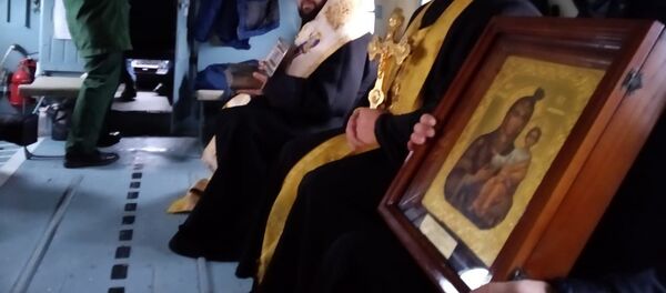 Облет территории Северной Осетии с молитвой о защите людей от коронавируса Облет территории Северной Осетии с молитвой о защите людей от коронавируса - Sputnik Южная Осетия