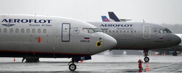 Аэропорт имени Хворостовского в Красноярске во время пандемии коронавируса Аэропорт имени Хворостовского в Красноярске во время пандемии коронавируса - Sputnik Южная Осетия