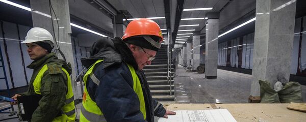 Инженер на строительстве станции Московского метрополитена Коммунарка на Сокольнической линии Инженер на строительстве станции Московского метрополитена Коммунарка на Сокольнической линии - Sputnik Южная Осетия