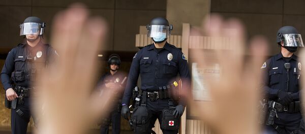 Полиция во время протестов в США Полиция во время протестов в США - Sputnik Южная Осетия