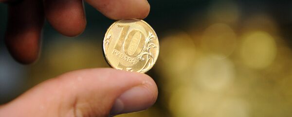 Чеканка новой 10-рублевой монеты на Московском монетном дворе Чеканка новой 10-рублевой монеты на Московском монетном дворе - Sputnik Южная Осетия